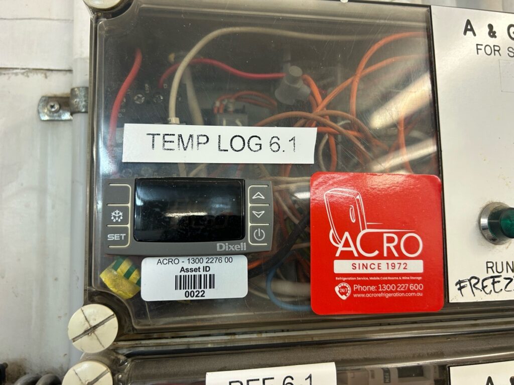 Digital temperature controller installed on a cool room