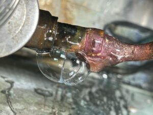 Gas leaking from a weld on a commercial refrigerated cold room