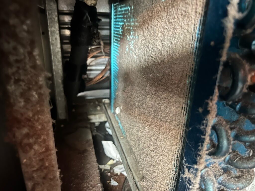 A condenser coil blocked by dirt