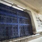 A filthy AC indoor unit at a bar on the Gold Coast