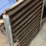 Disintegrated and filthy HVAC filter from a commercial venue, showing the result of years of neglected maintenance by a low-cost competitor.